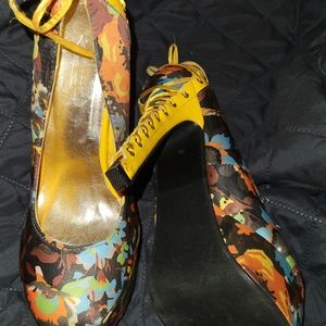 Never worn...Platform heels with lace up heel